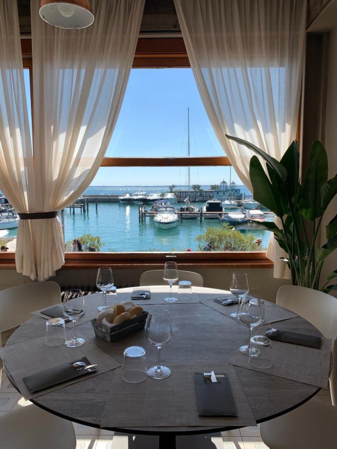 Albergo La Pescatrice Moniga del Garda ภายนอก รูปภาพ